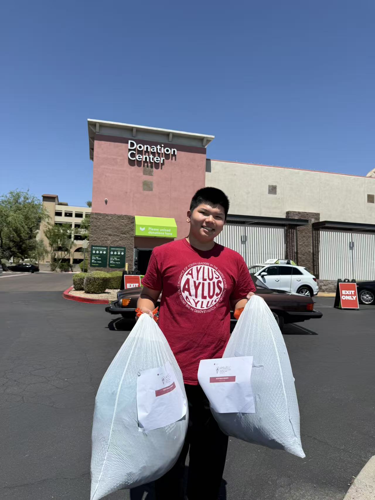AYLUS Scottsdale Branch Volunteers at Summer clothes donation on Jul 1, 2026