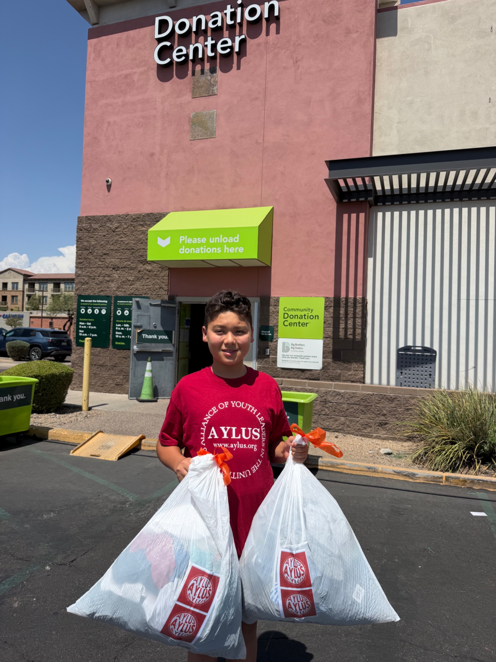 AYLUS Scottsdale Branch Volunteers at Summer clothes donation on Jul 1, 2026