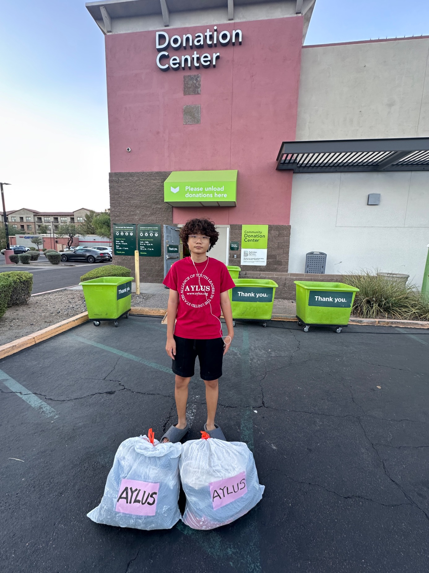 AYLUS Scottsdale Branch Volunteers at Summer clothes donation on Jul 1, 2026