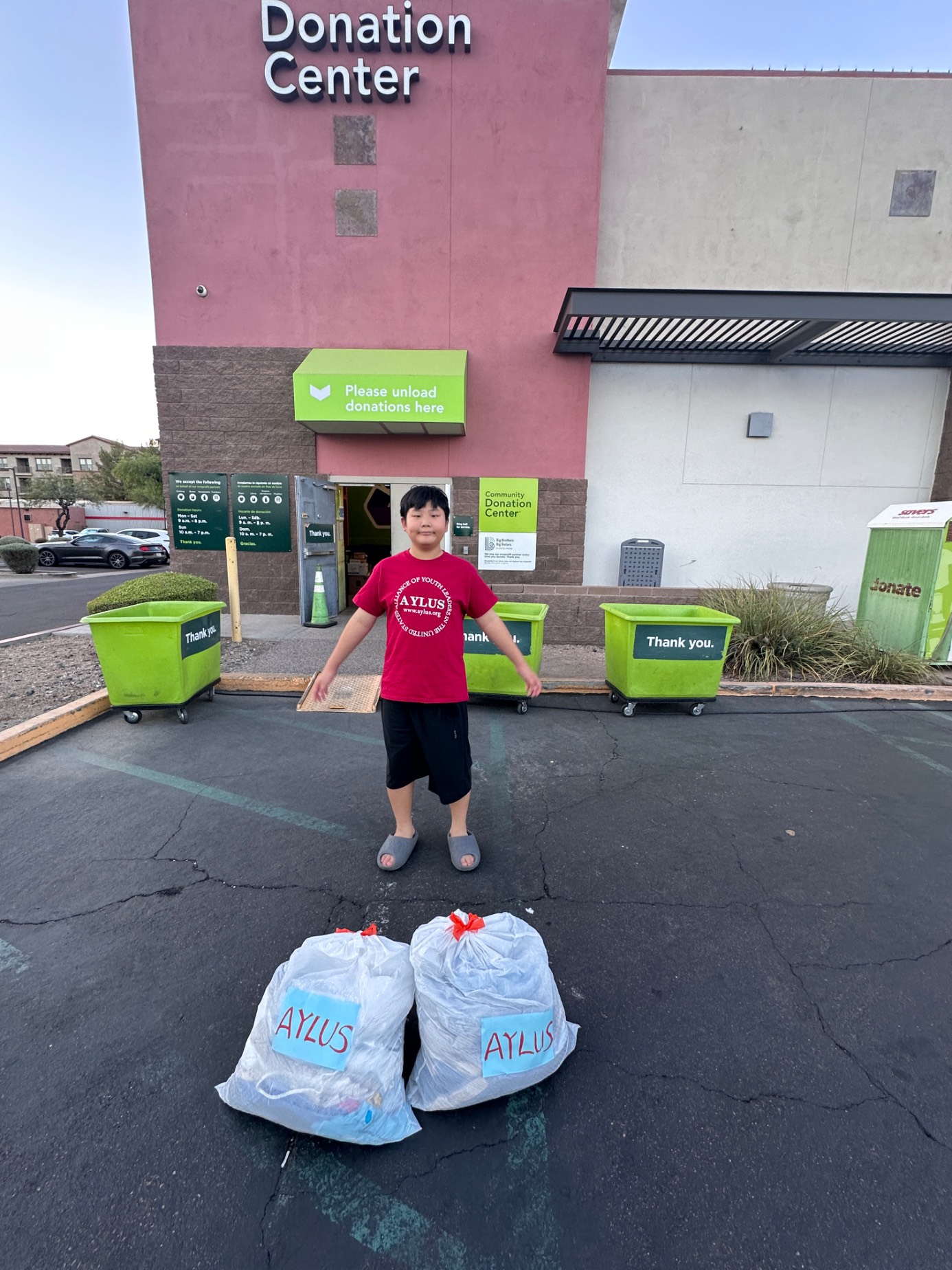 AYLUS Scottsdale Branch Volunteers at Summer clothes donation on Jul 1, 2026