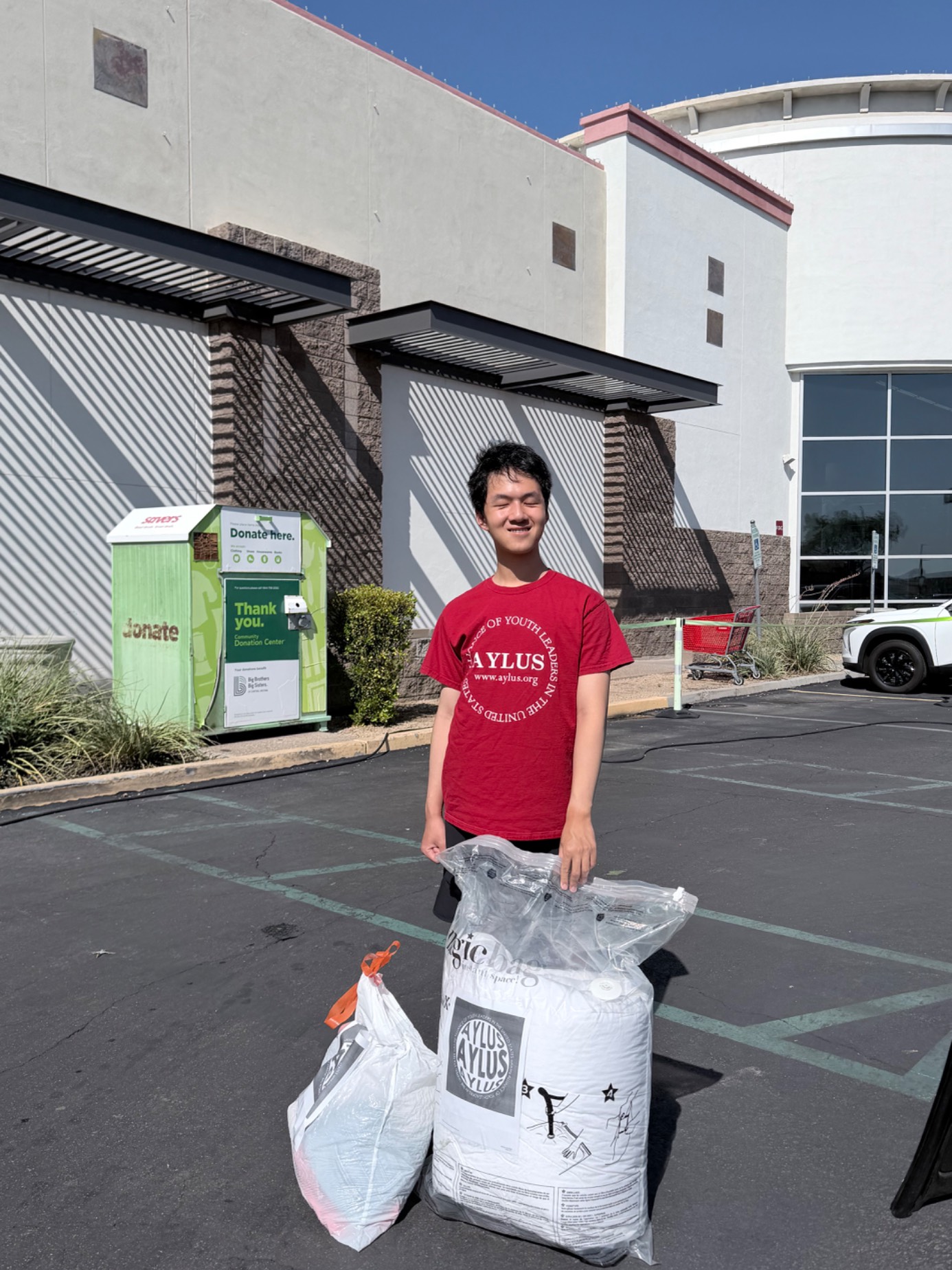 AYLUS Scottsdale Branch Volunteers at Summer clothes donation on Jul 1, 2026